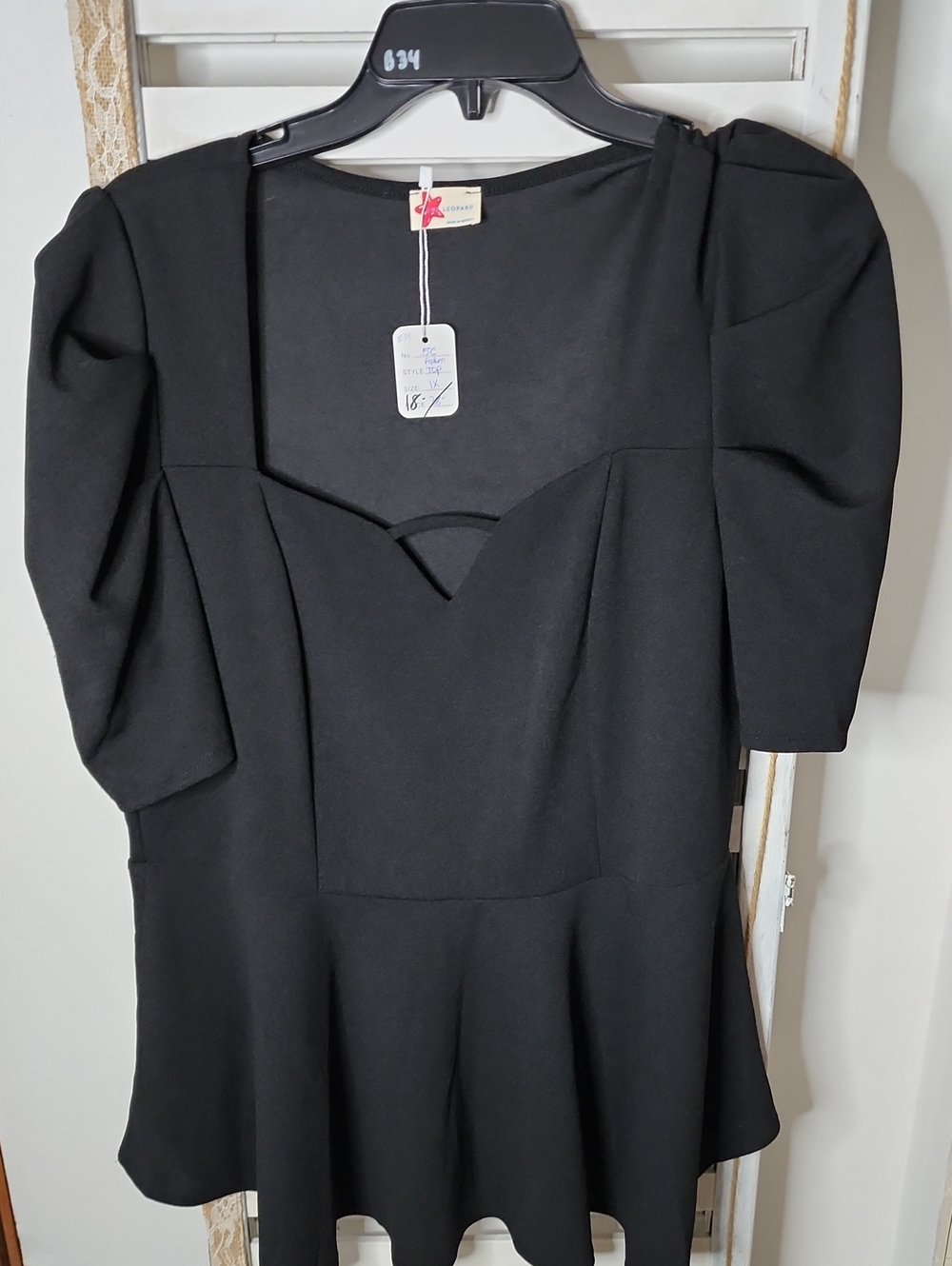 Black Peplum Top with Sweetheart Neckline